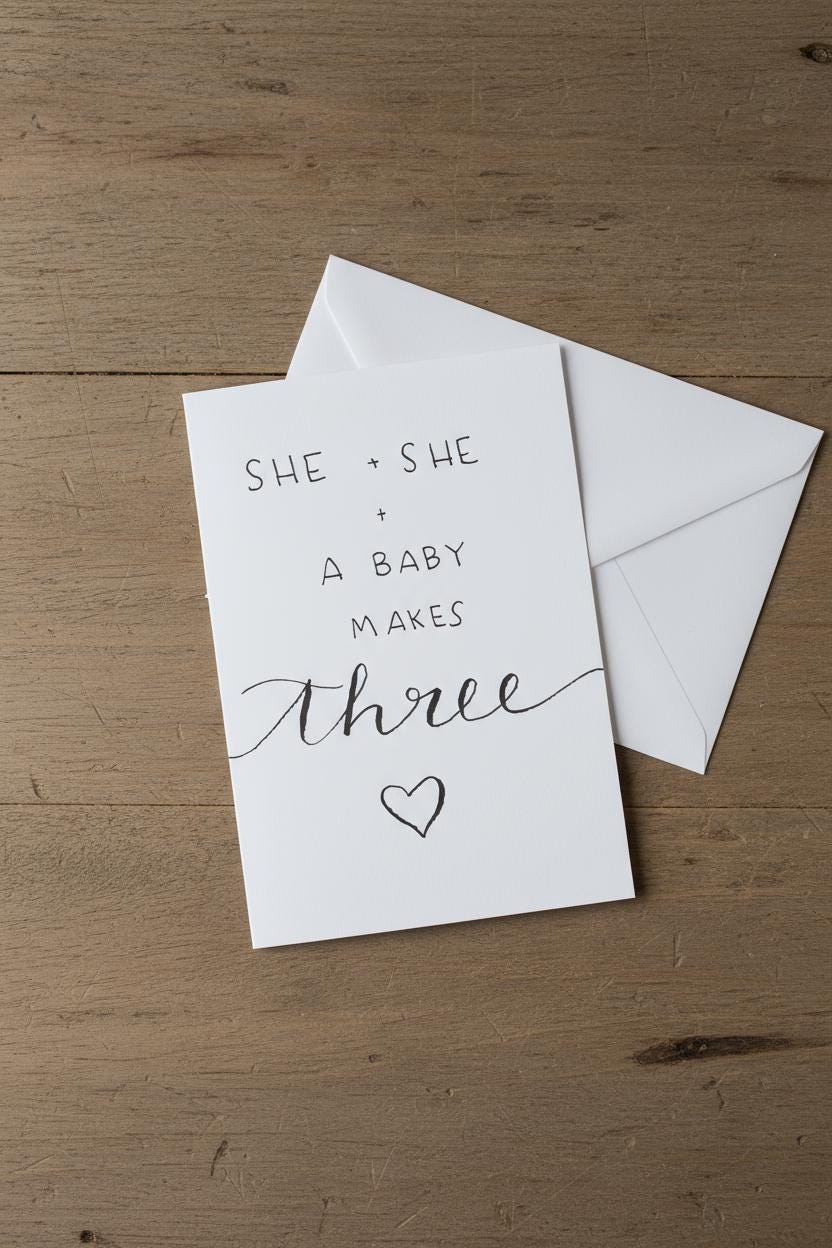 She and She and Baby; Baby Shower Celebratory Card; Hand-drawn script design; LGBTQ+ inclusive; printed on textured cardstock; New Moms