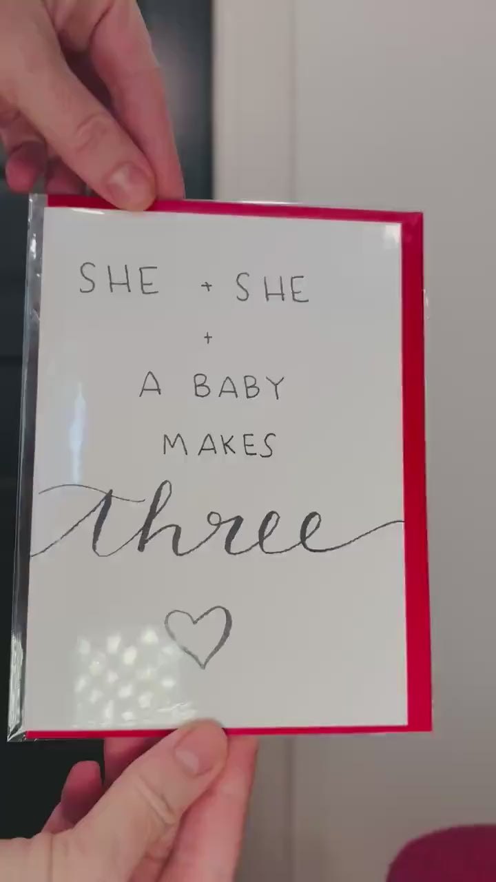 She and She and Baby; Baby Shower Celebratory Card; Hand-drawn script design; LGBTQ+ inclusive; printed on textured cardstock; New Moms